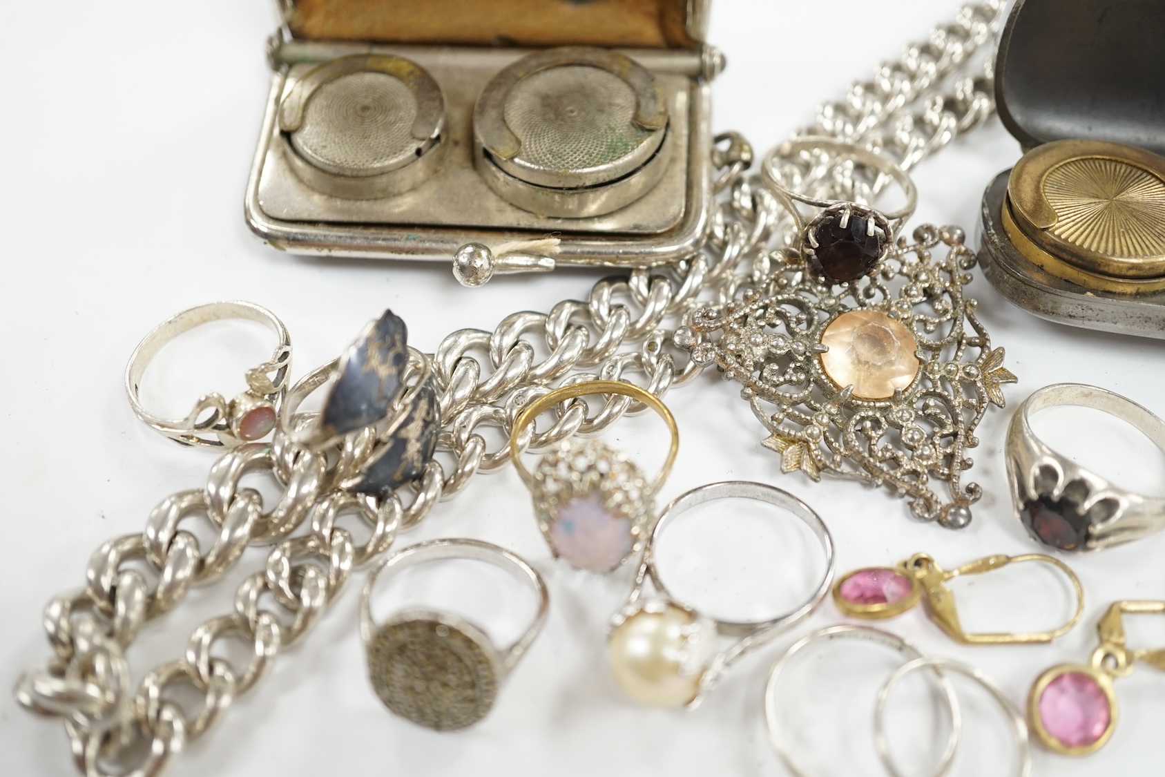 A silver graduated curb link albert, 41cm, two base metal sovereign cases and a small collection of assorted jewellery including silver and white metal rings. Condition - poor to fair to good